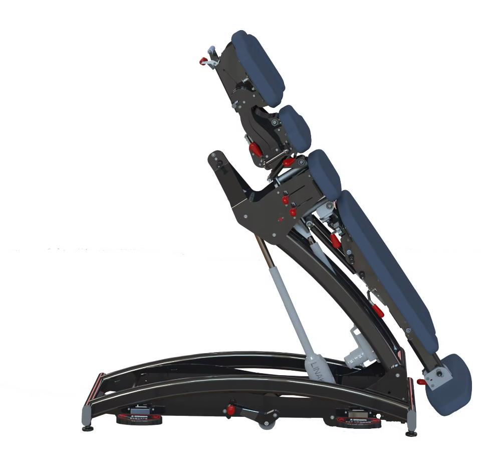 Electric operating table shown in steep tilt position