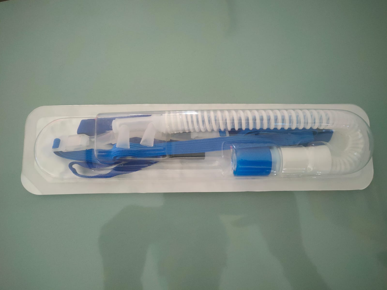 Sterile closed suction catheter system in a sealed blister pack